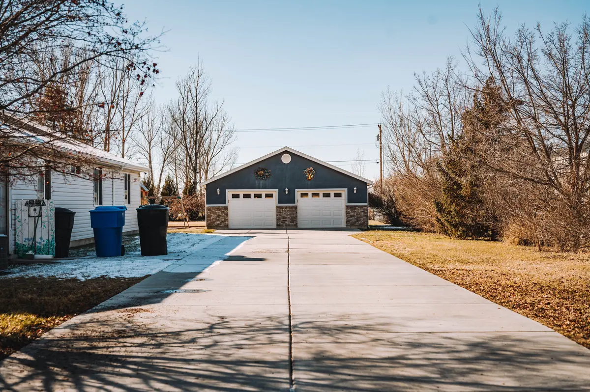 Detached residential garage and driveway